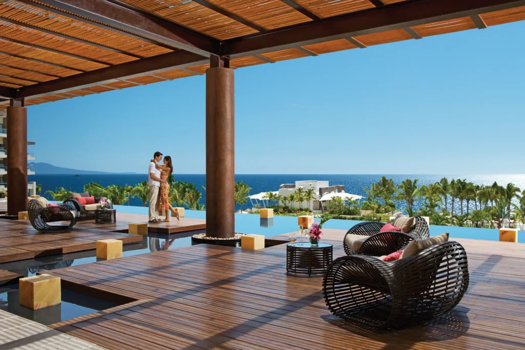 Open-air lobby terrace with ocean views during the day at Secrets Vallarta Bay Puerto Vallarta.