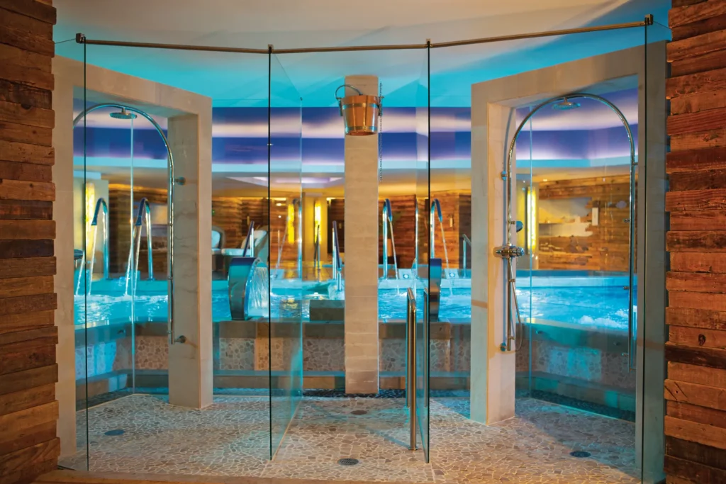 Spa hydrotherapy showers and water circuit at Secrets Vallarta Bay Puerto Vallarta featuring modern wellness design.