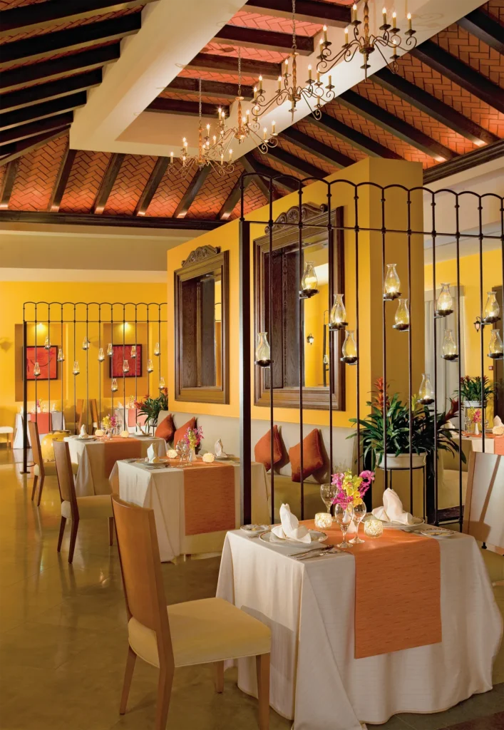 El Patio Mexican Restaurant at Secrets Wild Orchid Montego Bay featuring elegant indoor dining, warm décor, and authentic Mexican cuisine.