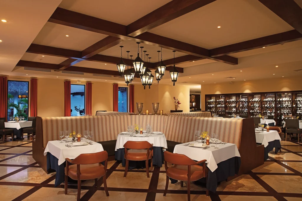 Portofino Italian Restaurant at Secrets Wild Orchid Montego Bay featuring romantic open-air dining, elegant décor, and ocean views.