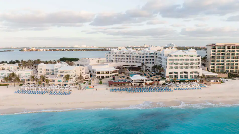 Aerial beachfront view of Sunscape Cancun Resort & Spa overlooking turquoise waters and white-sand beaches in Cancun.