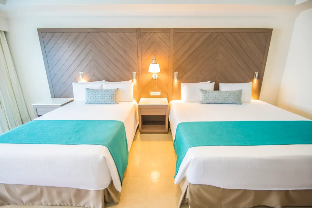 Junior Suite Beachfront room with double beds at Sunscape Cancun Resort & Spa.