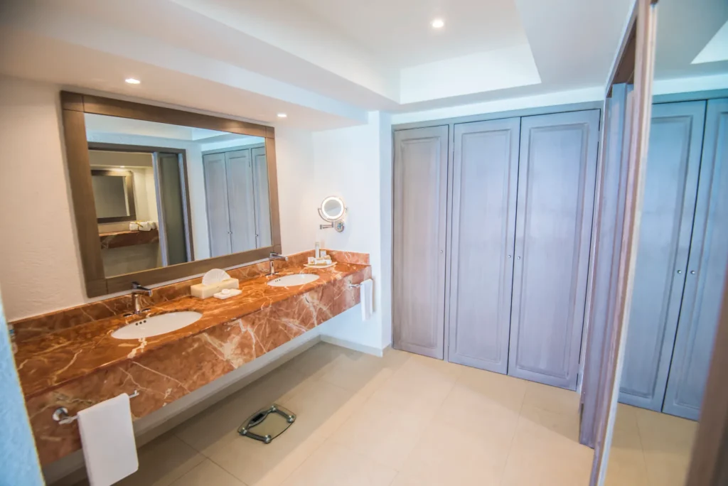 Master Suite Ocean View bathroom with double vanity at Sunscape Cancun Resort & Spa.