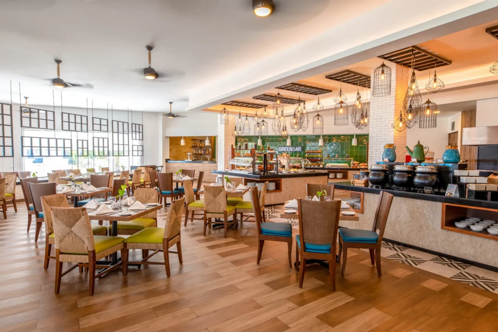 Ventanas restaurant at Sunscape Cancun Resort & Spa featuring contemporary dining décor, elegant seating, and panoramic resort views.