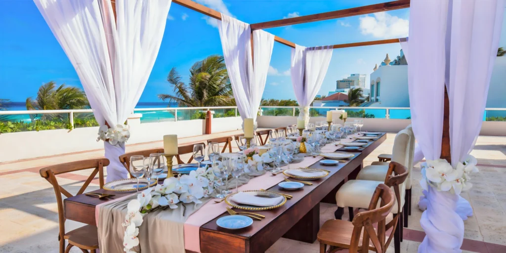 Villas Terrace oceanfront wedding reception setup at Sunscape Cancun Resort & Spa