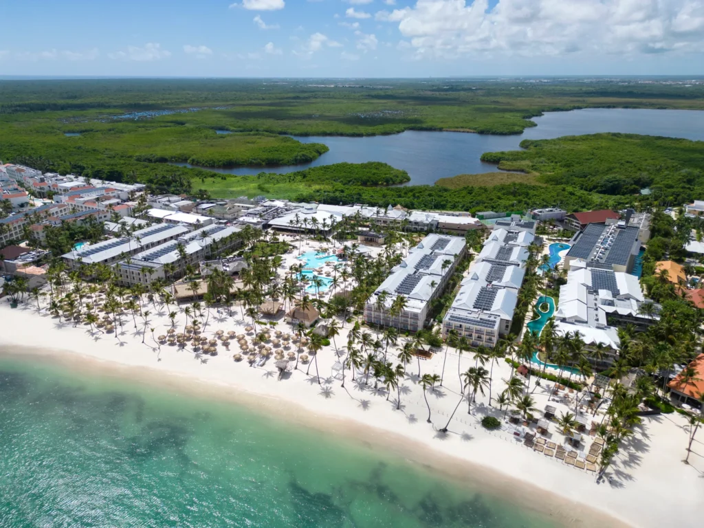 Aerial overview of Sunscape Coco Punta Cana Resort and surrounding tropical landscape.