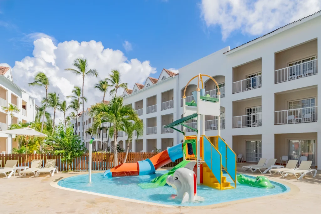 Colorful splash pool and kids water play area at Sunscape Coco Punta Cana Resort.
