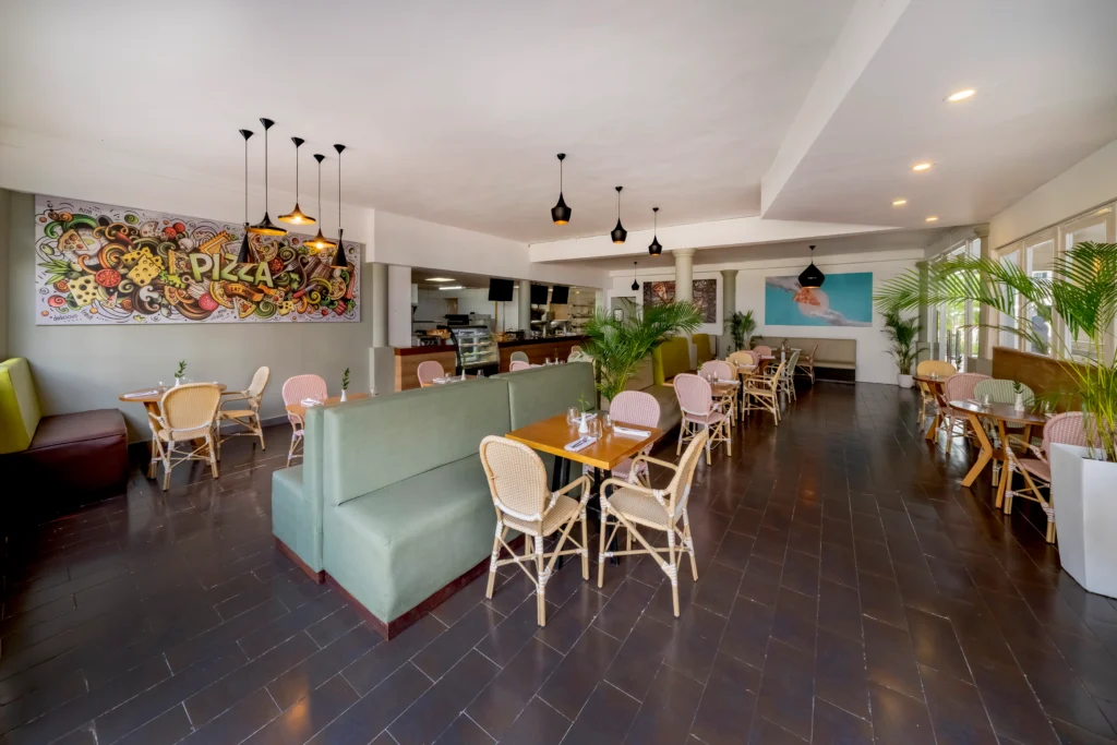 The Pizza Shop at Sunscape Coco Punta Cana featuring casual pizzeria-style dining, freshly baked pizzas, and a relaxed family-friendly atmosphere.