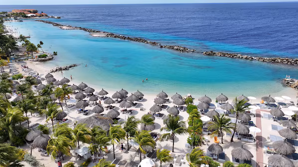 Mambo Beach near Sunscape Curaçao Resort Spa & Casino with vibrant beachfront and clear Caribbean waters
