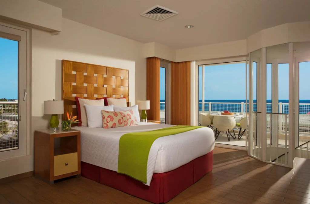 Presidential Suite living area with sofa seating and entertainment space at Sunscape Curaçao Resort.