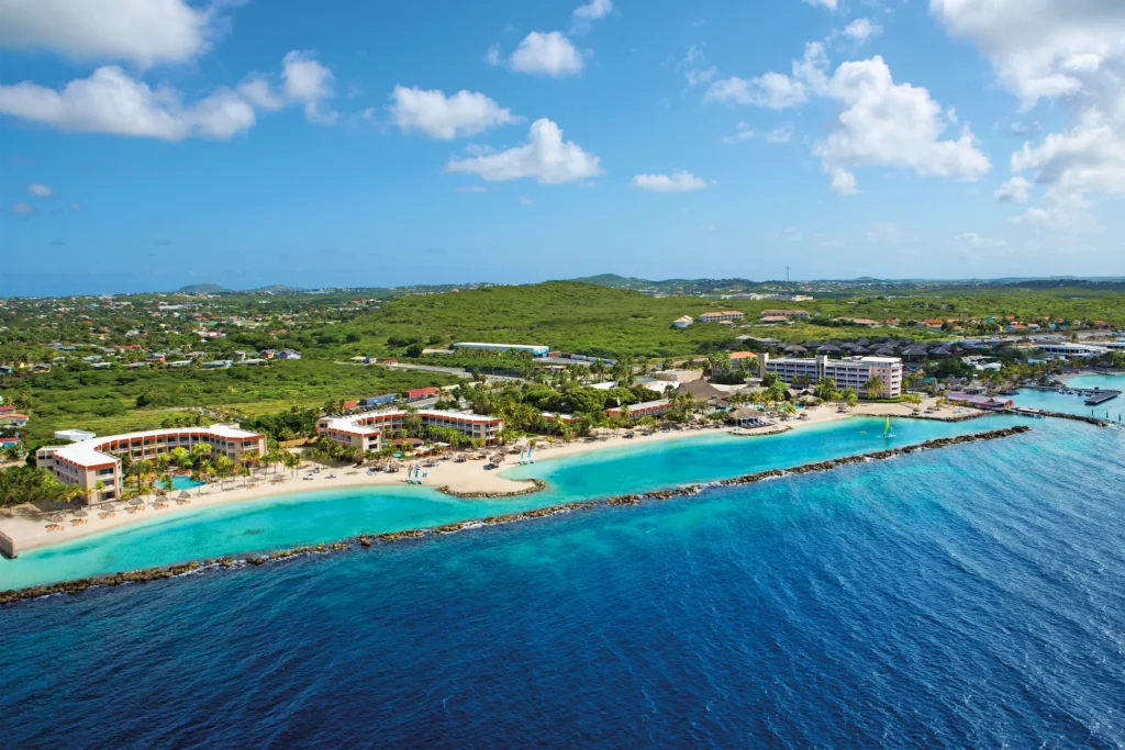 Aerial view of Sunscape Curaçao Resort, Spa & Casino along the Caribbean coastline.