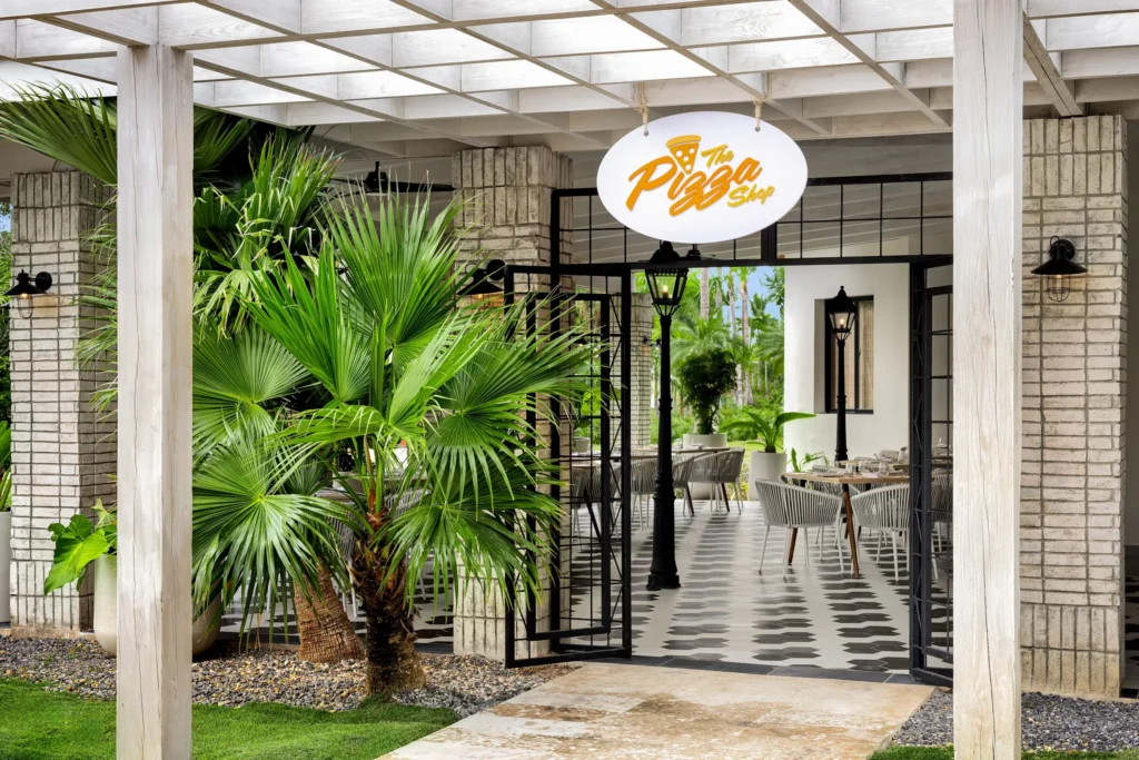 The Pizza Shop at Sunscape Dominicus La Romana featuring a casual takeout counter with fresh-made pizzas and quick bites.