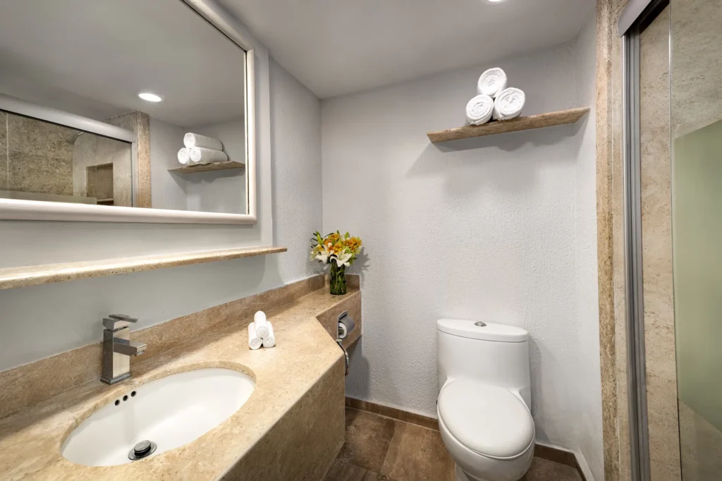 Deluxe Ocean View bathroom with walk-in shower at Sunscape Dorado Pacifico Ixtapa.