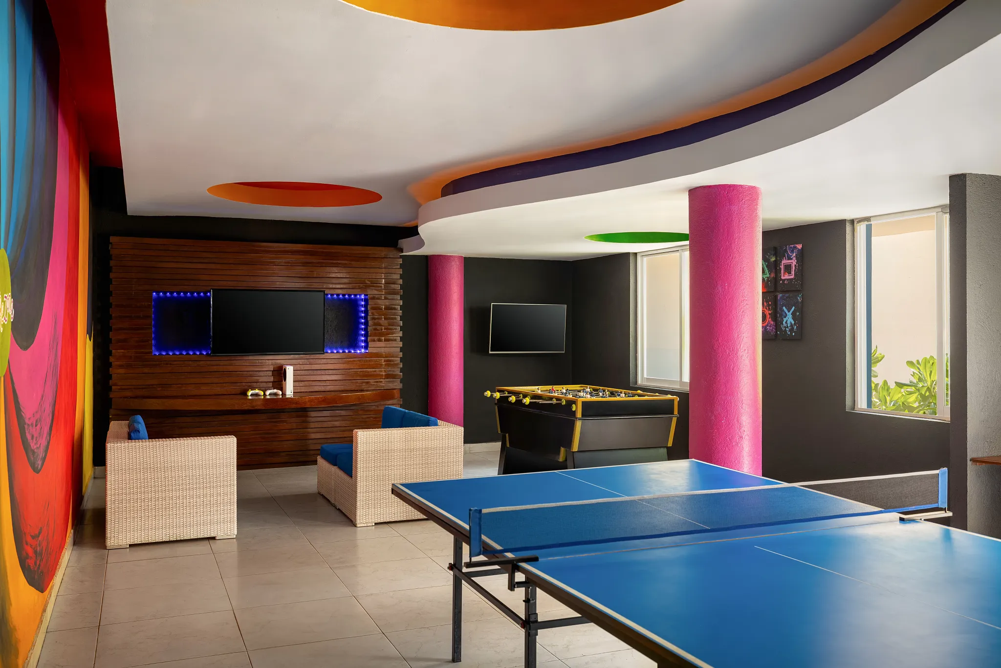 Indoor Core Zone teens club with ping pong and foosball tables at Sunscape Dorado Pacifico Ixtapa.