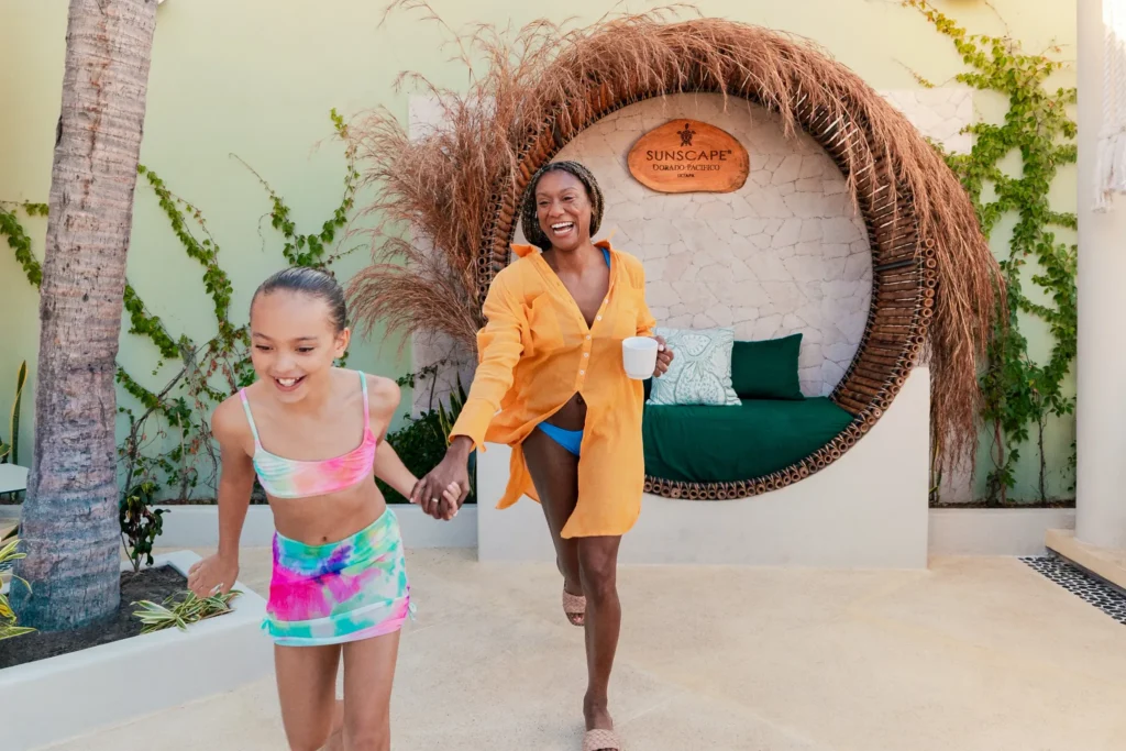 Mother and daughter walking near the Sun Club area at Sunscape Dorado Pacifico Ixtapa.
