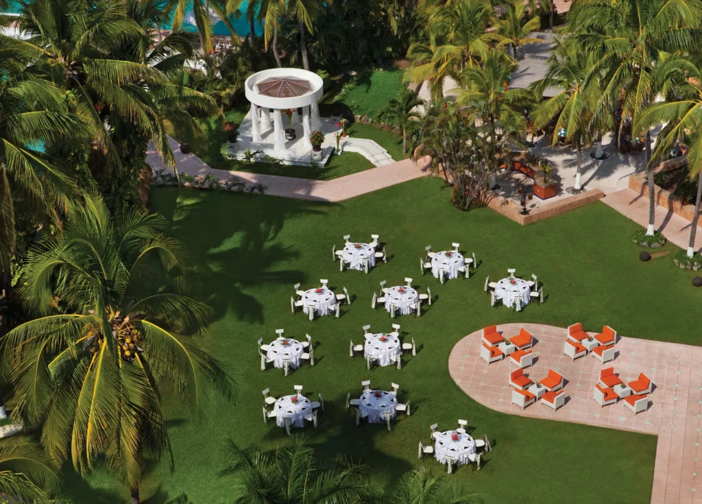 Tropical wedding garden reception setup at Sunscape Dorado Pacifico Ixtapa