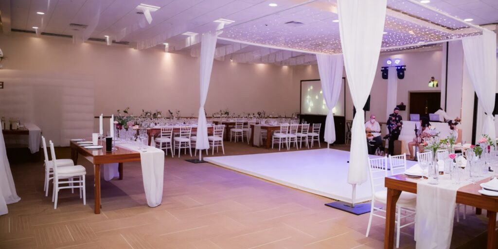 Elegant ballroom wedding reception with draped décor at Sunscape Puerto Vallarta Resort & Spa