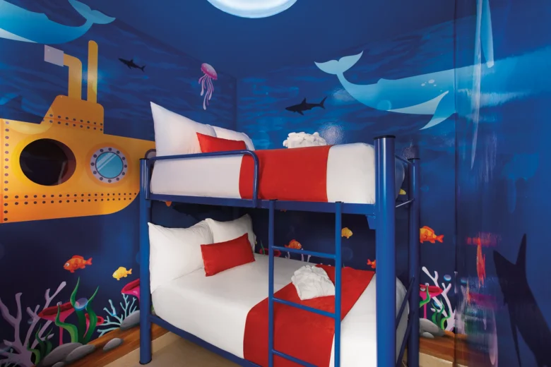 Deluxe Family Kids room with bunk beds and underwater-themed décor at Sunscape Puerto Vallarta Resort & Spa.