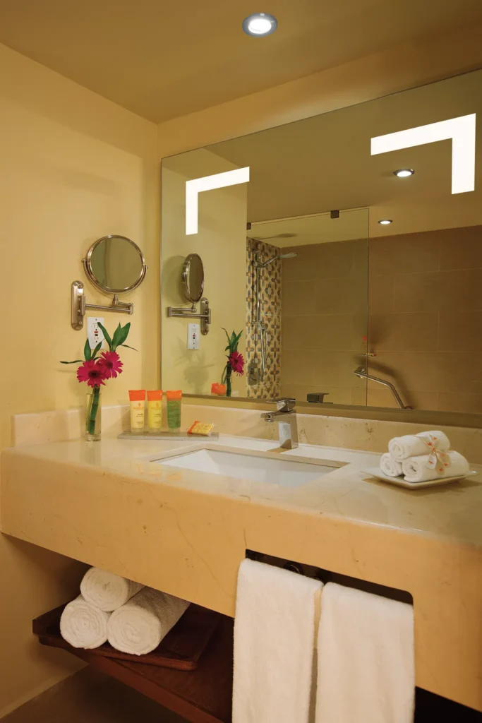Sun Club Junior Suite Ocean Front bathroom with modern vanity and walk-in shower at Sunscape Puerto Vallarta Resort & Spa.