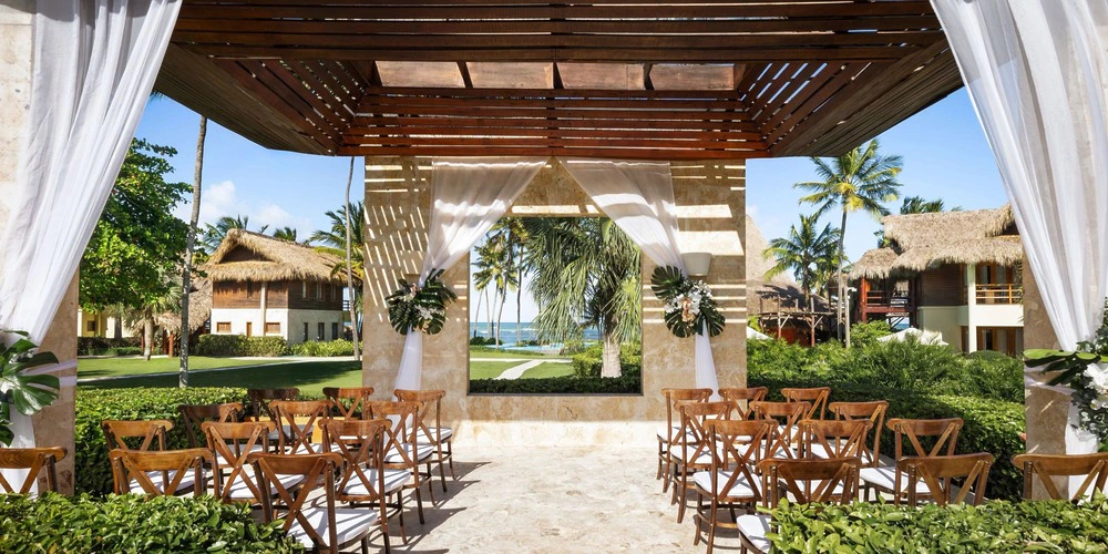 Garden gazebo wedding ceremony setup at Zoetry Agua Punta Cana with ocean views