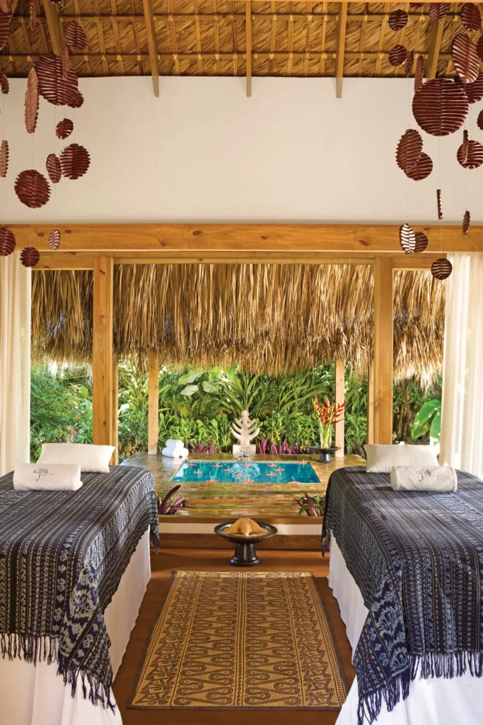 Private spa massage room with two treatment beds at Zoëtry Agua Punta Cana.