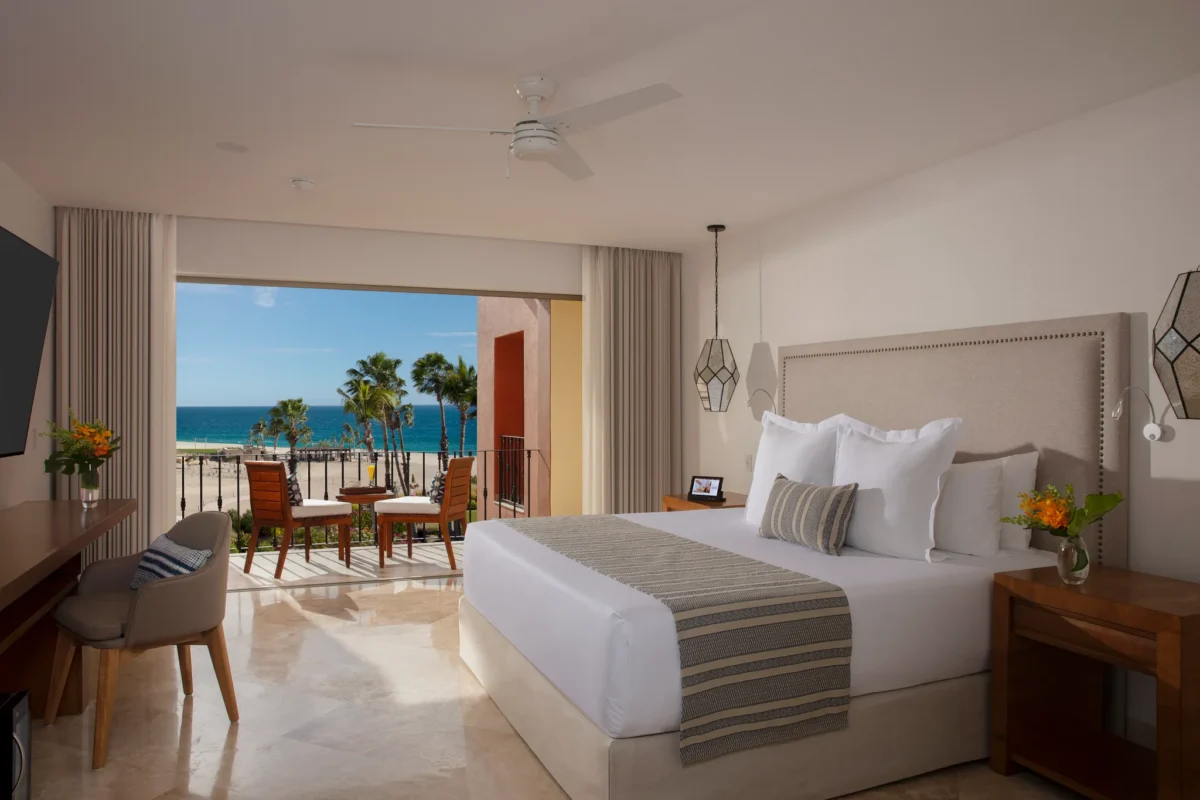 Deluxe Partial Ocean View room with king bed and balcony at Zoëtry Casa del Mar Los Cabos.
