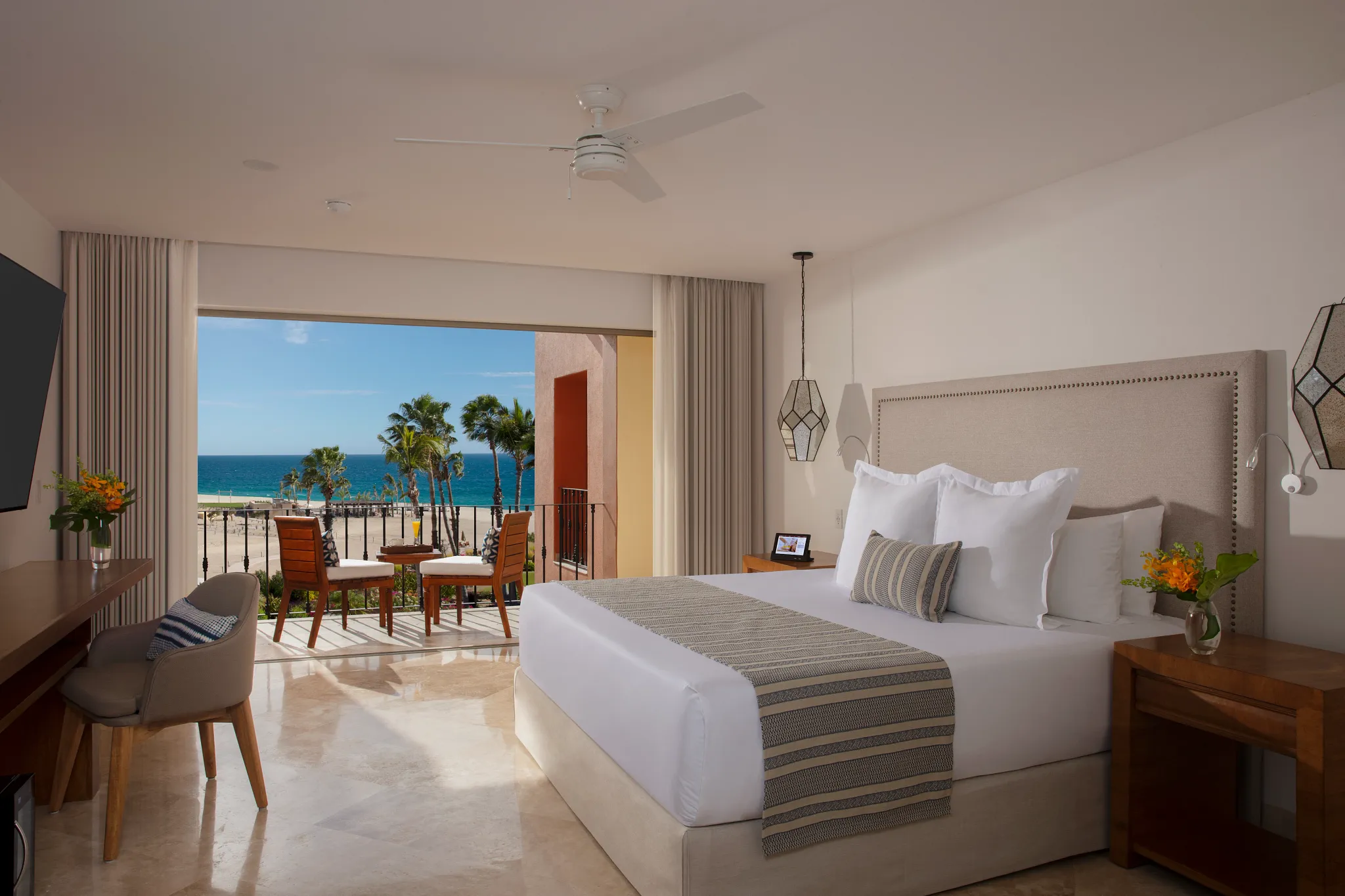 Deluxe Partial Ocean View room with king bed and balcony at Zoëtry Casa del Mar Los Cabos.