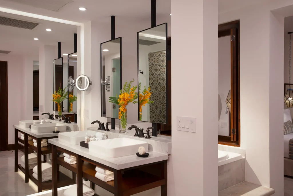 Junior Suite Ocean View bathroom with double vanity and rain shower at Zoëtry Casa del Mar Los Cabos.