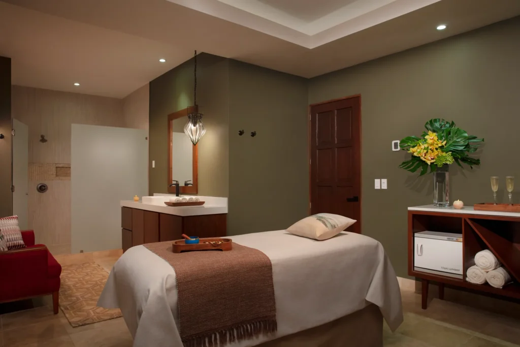 Serene spa treatment room with massage table at Zoëtry Casa del Mar Los Cabos.