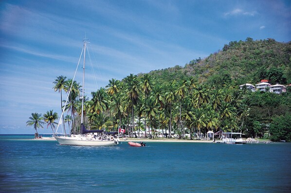 Marigot Bay marina with sailboats and tropical hillside views near Zoëtry Marigot Bay St. Lucia
