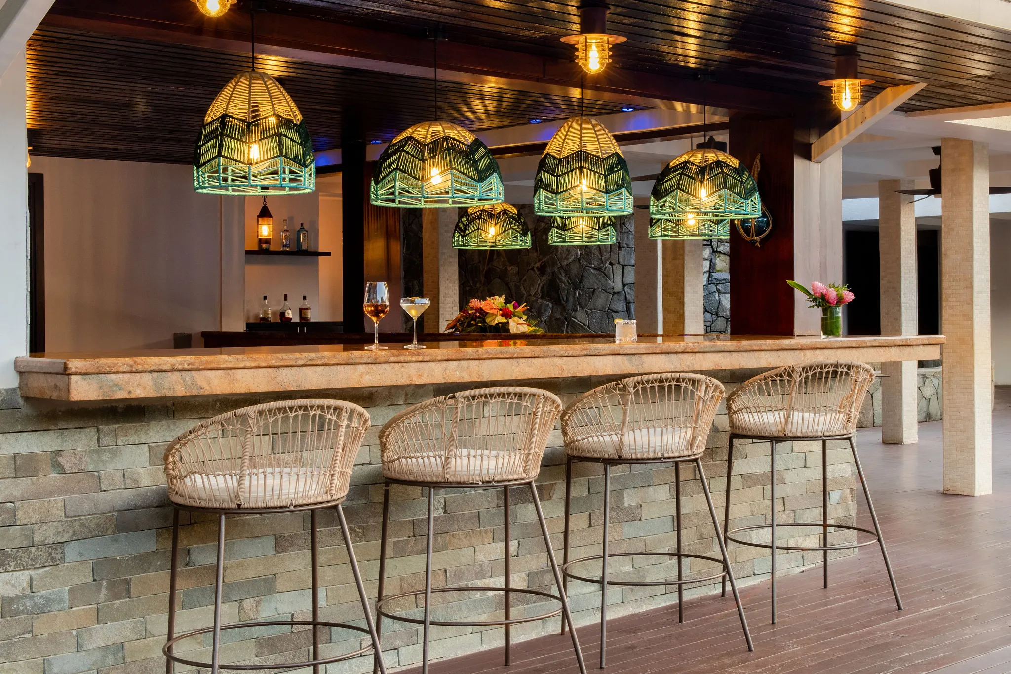 Rum Cave Bar at Zoëtry Marigot Bay St. Lucia featuring an elegant lounge with handcrafted cocktails and specialty rum selections.