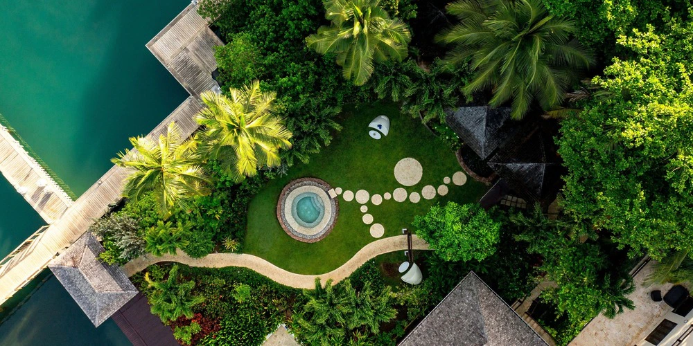 Spa Lawn garden wedding venue surrounded by tropical greenery at Zoetry Marigot Bay St. Lucia