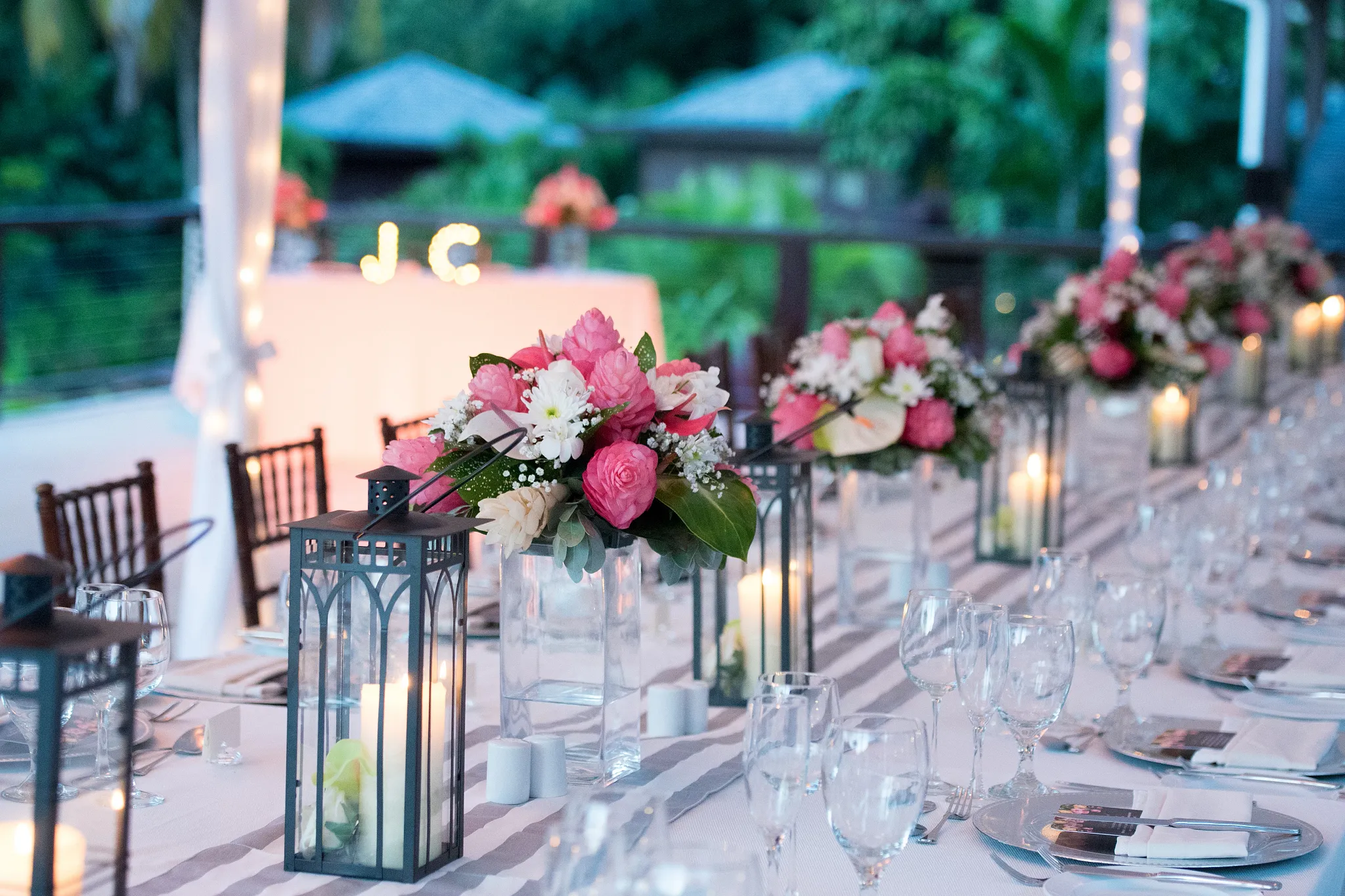 Romantic candlelit wedding reception setup at Boudreau Terrace at Zoëtry Marigot Bay St. Lucia