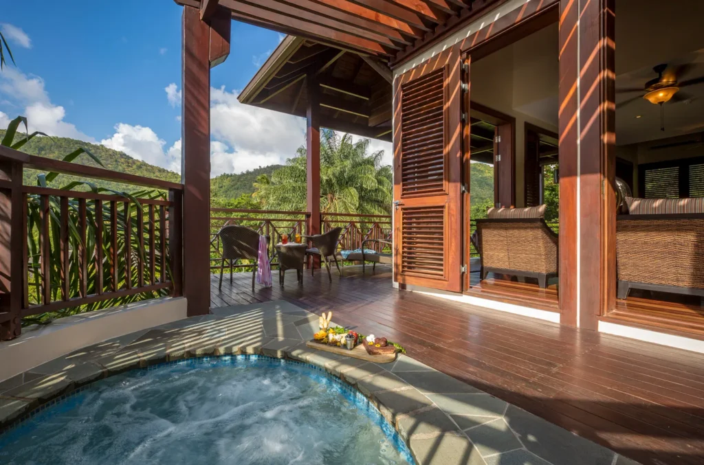 Private plunge pool terrace at Penthouse Three Bedroom Residence in Zoëtry Marigot Bay St. Lucia overlooking lush Caribbean hills.