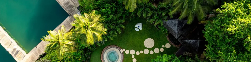 Aerial overhead view of the spa garden and hot tub at Zoëtry Marigot Bay St. Lucia near the marina.