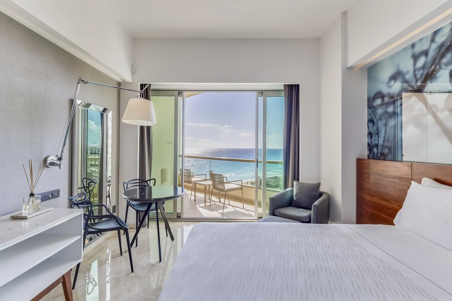 Premium ocean-view king room with balcony at Live Aqua Cancun.