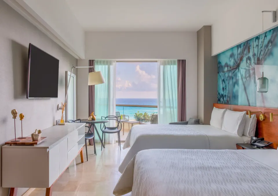 Premium ocean-view room with two beds at Live Aqua Cancun.
