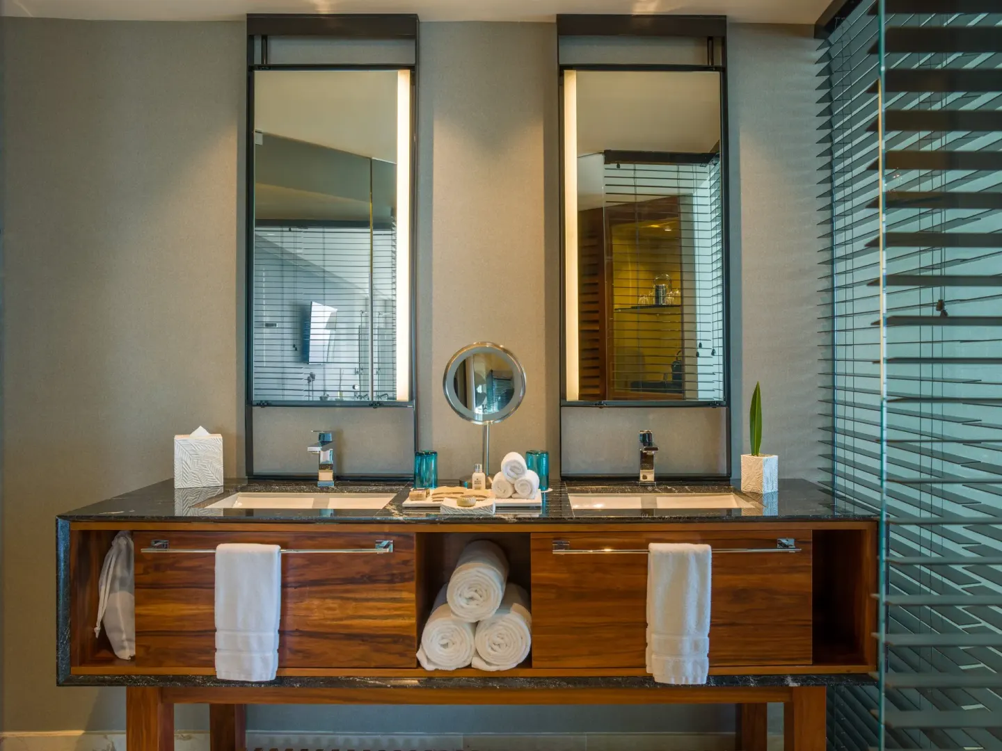 Premium Room double-sink bathroom vanity with mirrors at Live Aqua Cancun.