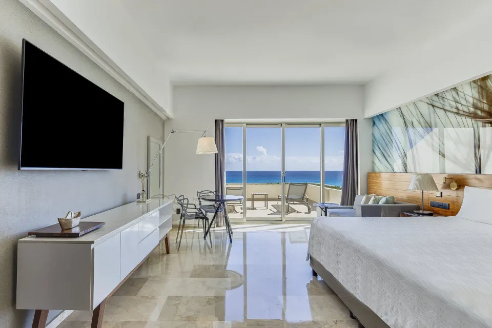 Premium Room king bed with terrace and ocean view at Live Aqua Cancun.