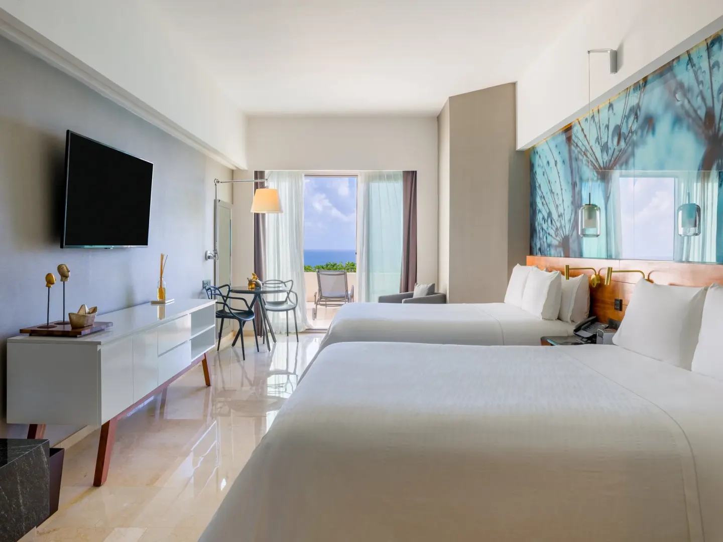 Premium Room with two beds, TV console, and terrace doorway at Live Aqua Cancun.