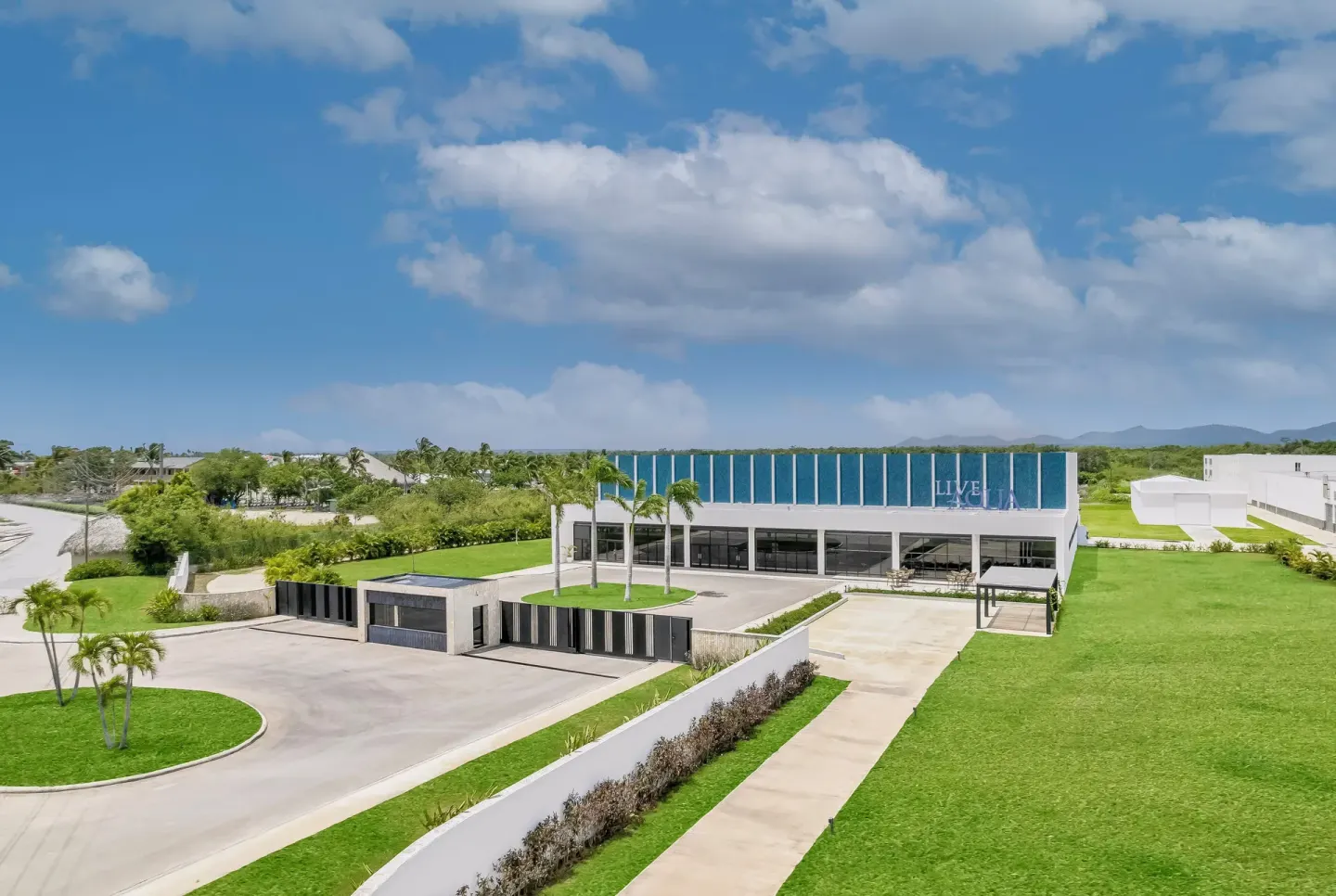 Aerial view of the entrance building and lawns at Live Aqua Punta Cana.