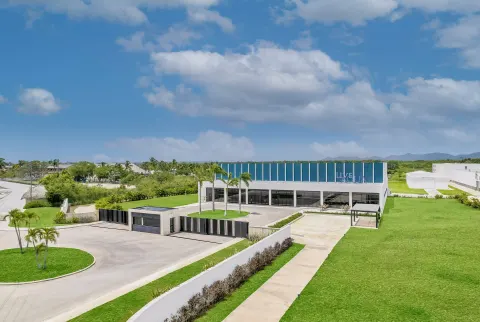 Aerial view of the entrance building and lawns at Live Aqua Punta Cana.