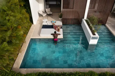 Aqua Junior Suite swim-up pool with daybed at Live Aqua Punta Cana.