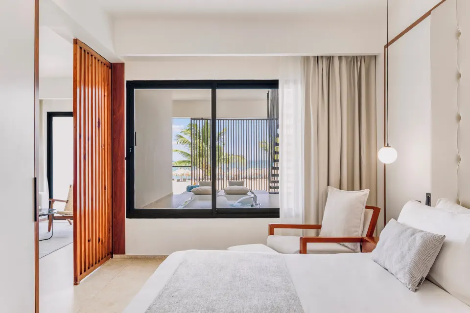 Viento Suite Ocean Front bedroom with terrace view at Live Aqua Punta Cana.