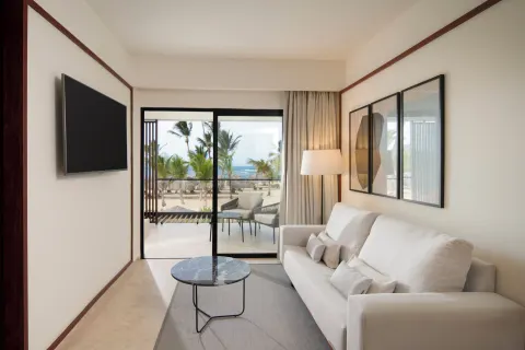Viento Suite Ocean Front living room with terrace view at Live Aqua Punta Cana.
