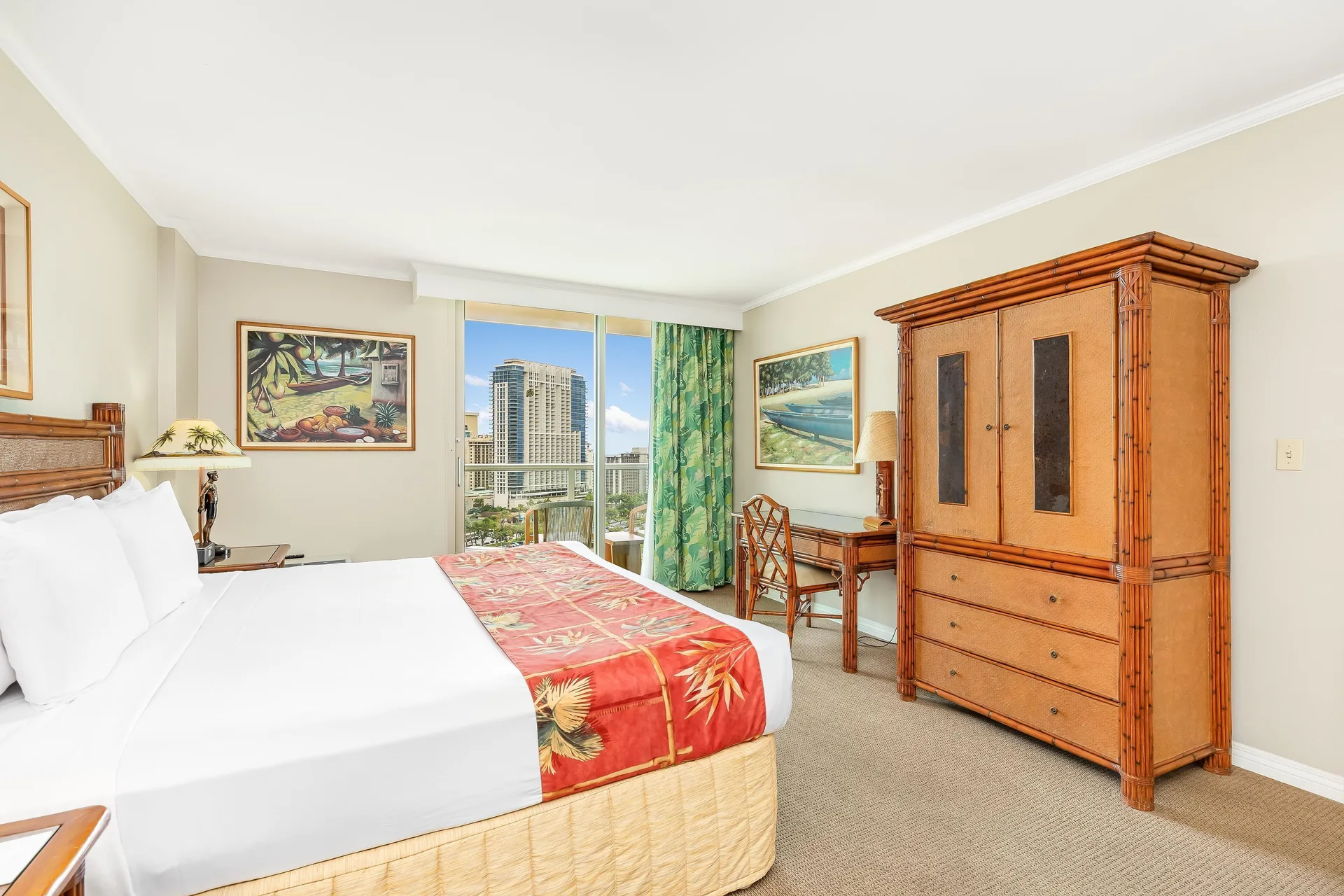 Ocean View One Bedroom Suite with Full Kitchen at Luana Waikiki Hotel & Suites featuring king bed, bedroom balcony, and Pacific Ocean views in Waikiki.