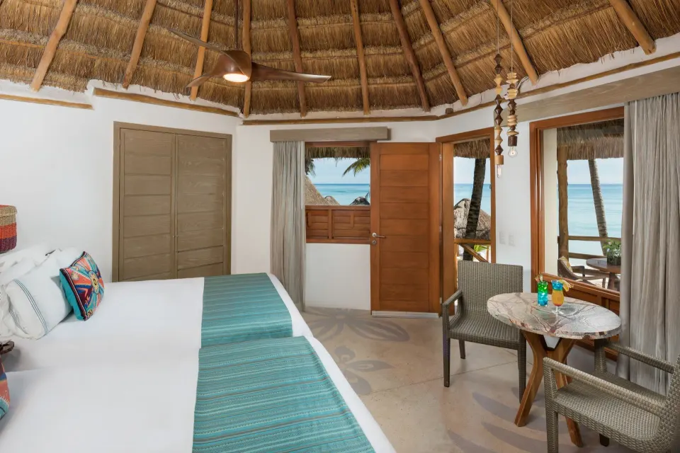 Beachfront room with twin beds and ocean view at Mahekal Beach Front Resort & Spa