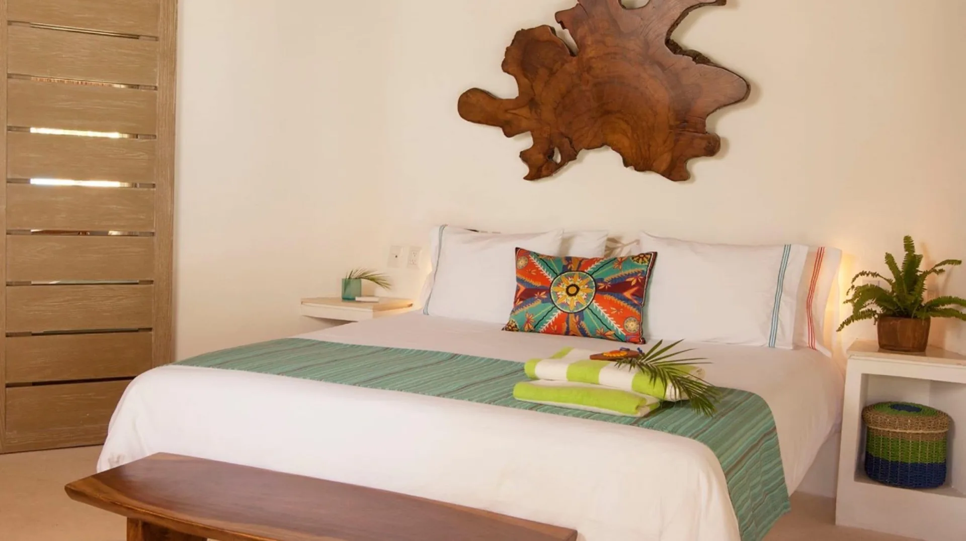 Run of House king guest room with white bedding at Mahekal Beach Front Resort & Spa.