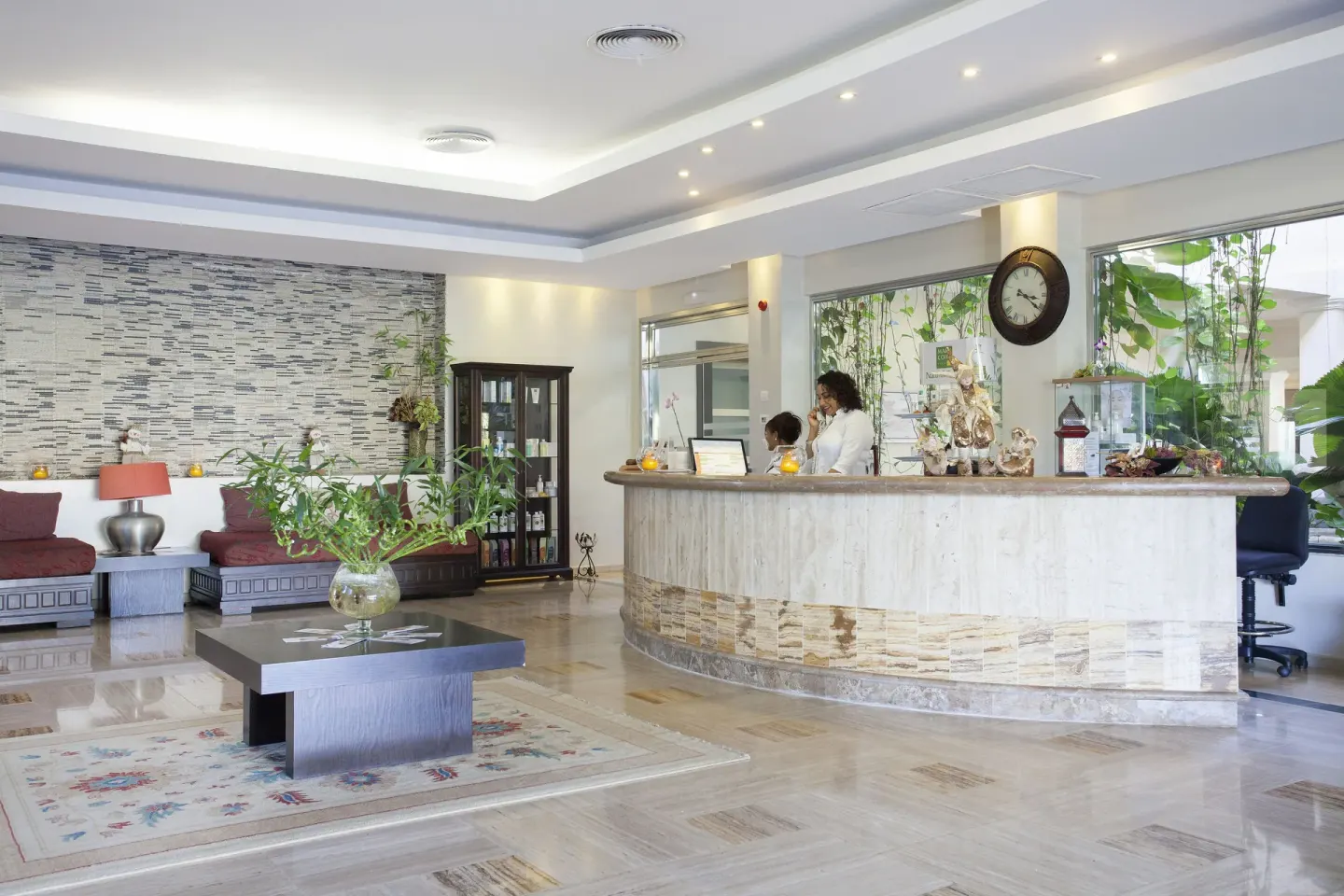 Spa reception desk with lounge seating at Majestic Elegance Punta Cana.