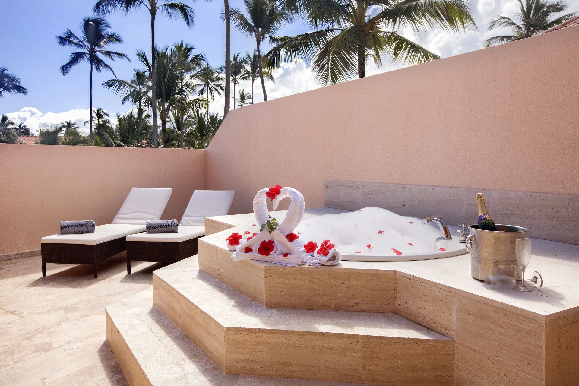 Colonial Junior Suite terrace with outdoor Jacuzzi at Majestic Elegance Punta Cana.